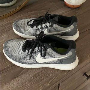 Black and White Nike Running Shoes